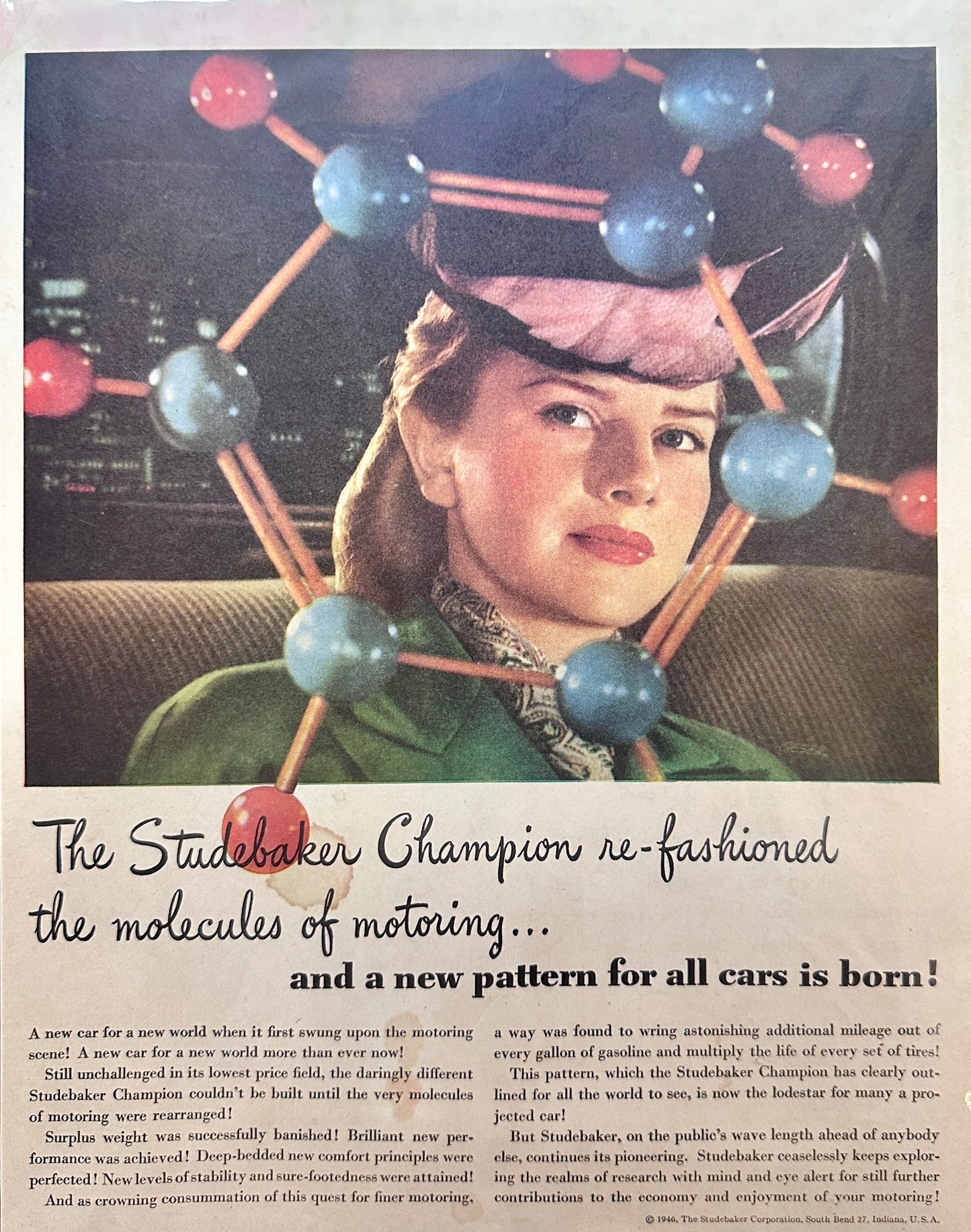 1946 Studebaker Champion - Refashioned the Molecules of Motoring Ad