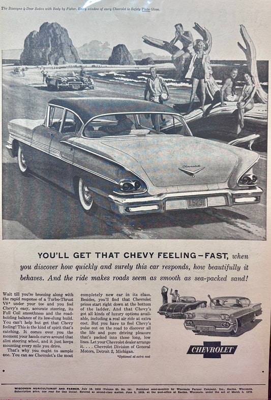 1958 Chevrolet Biscayne and Corvette parked on the beach - Vintage Ad